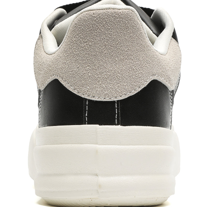 Side view of Movo Splash T84 sneakers showing the waterproof shell and oversized platform