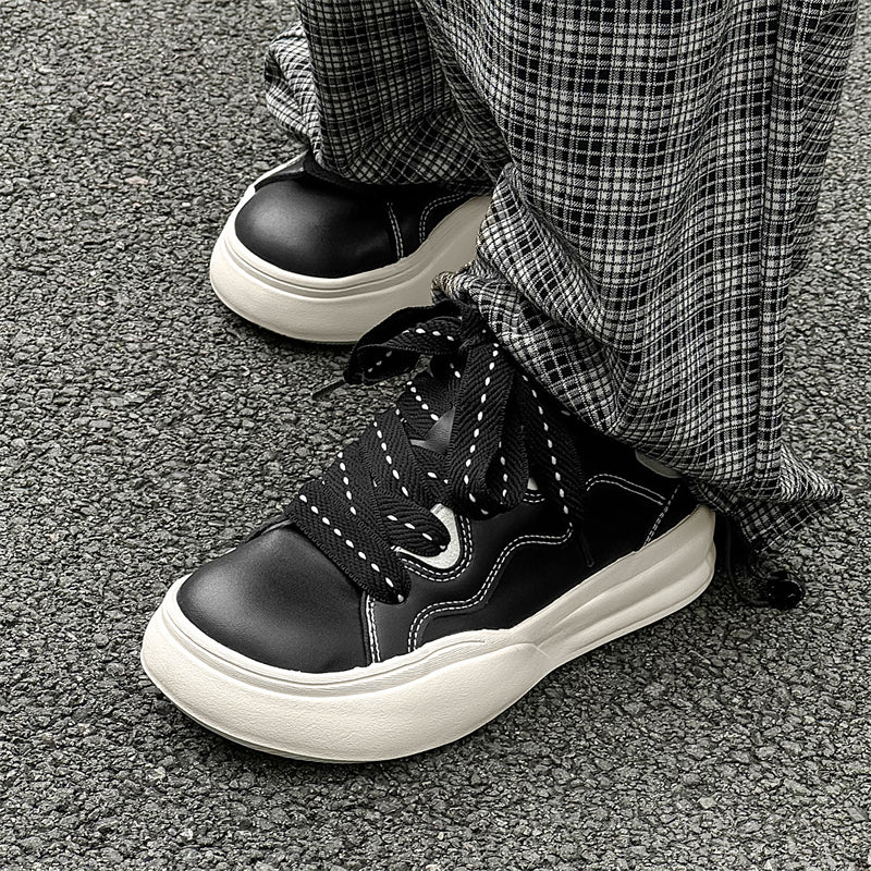 Side view of Movo Splash T84 sneakers showing the waterproof shell and oversized platform