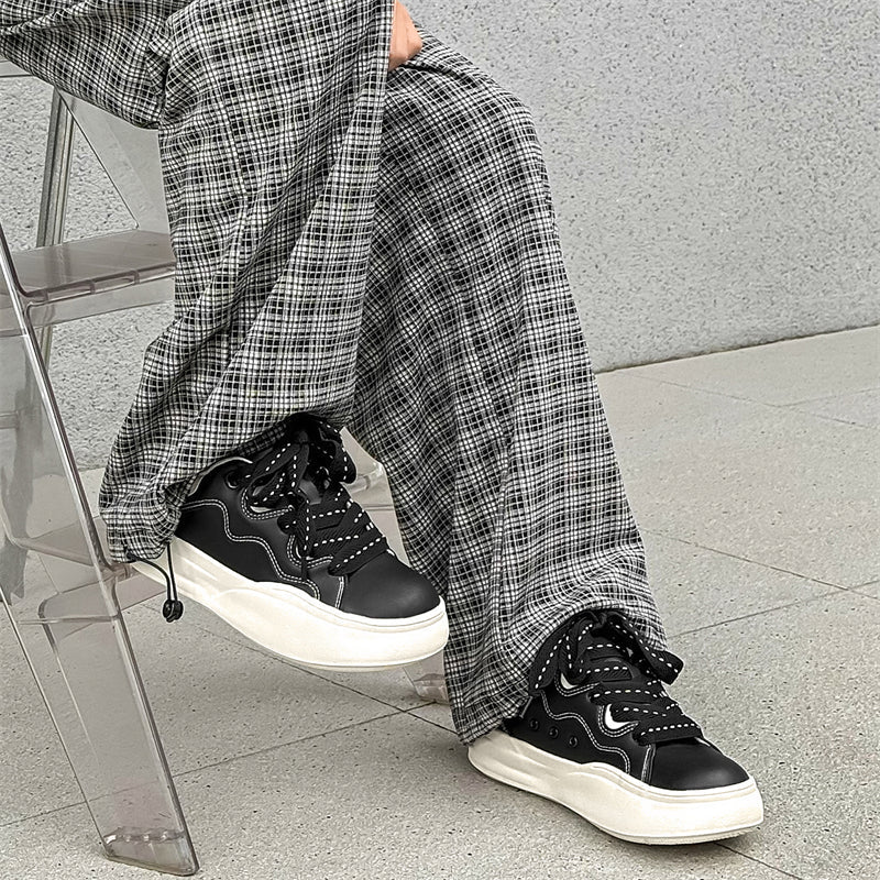 Side view of Movo Splash T84 sneakers showing the waterproof shell and oversized platform
