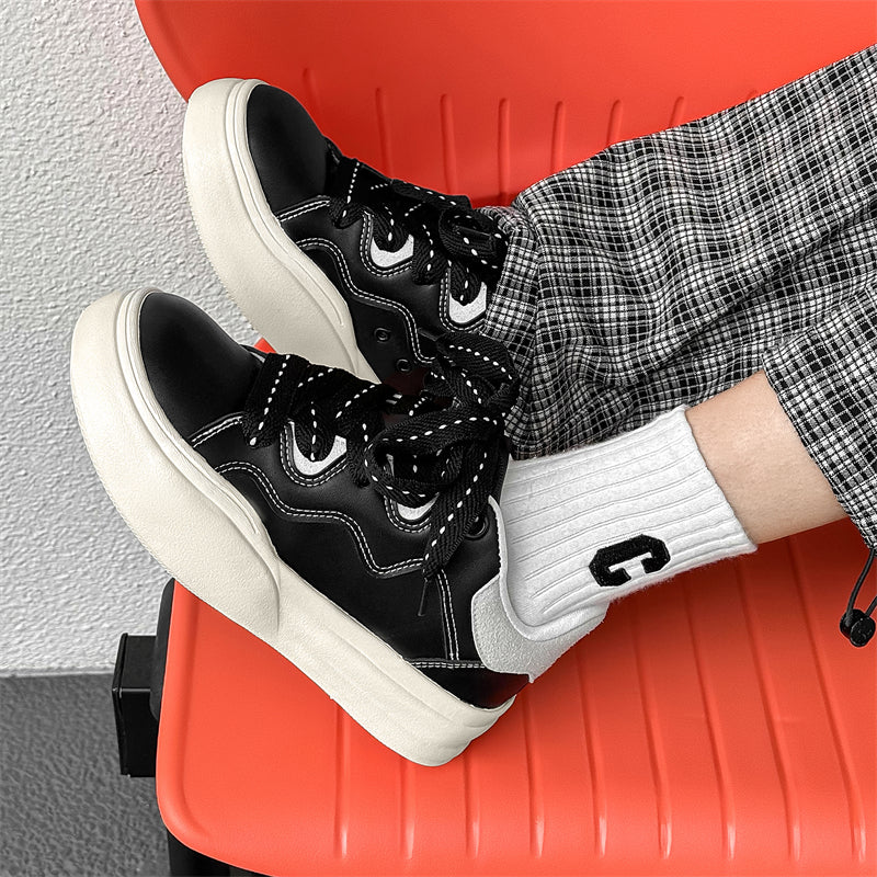 Side view of Movo Splash T84 sneakers showing the waterproof shell and oversized platform