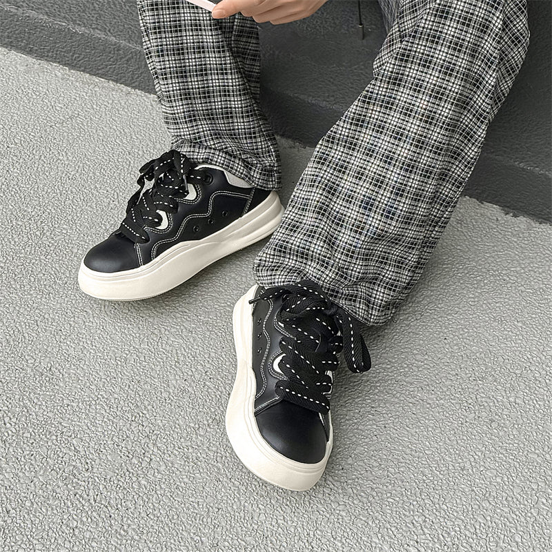 Side view of Movo Splash T84 sneakers showing the waterproof shell and oversized platform