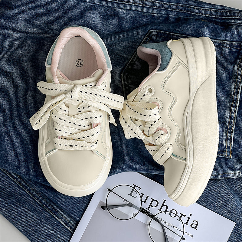 Side view of Movo Splash T84 sneakers showing the waterproof shell and oversized platform
