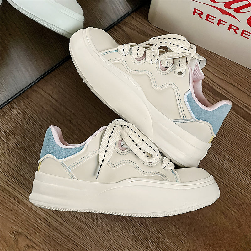 Side view of Movo Splash T84 sneakers showing the waterproof shell and oversized platform
