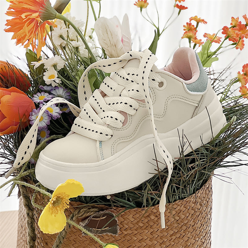 Side view of Movo Splash T84 sneakers showing the waterproof shell and oversized platform