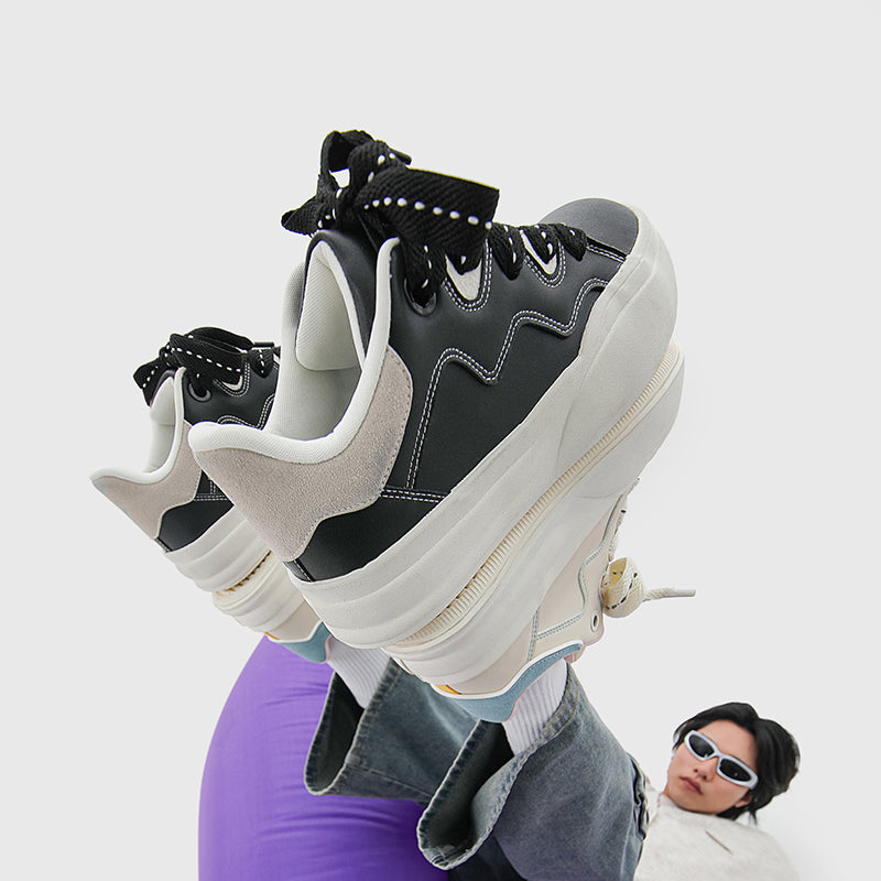 Side view of Movo Splash T84 sneakers showing the waterproof shell and oversized platform