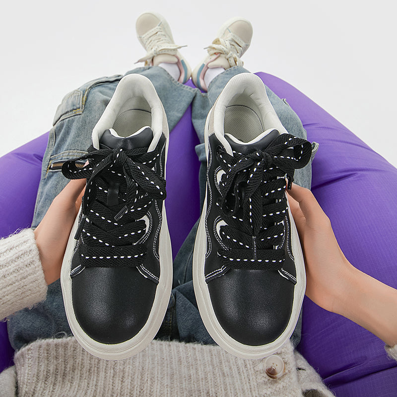 Side view of Movo Splash T84 sneakers showing the waterproof shell and oversized platform
