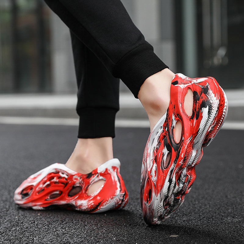 Side profile of Garuda Cloud T84 Foam Runners showing organic ventilation holes
