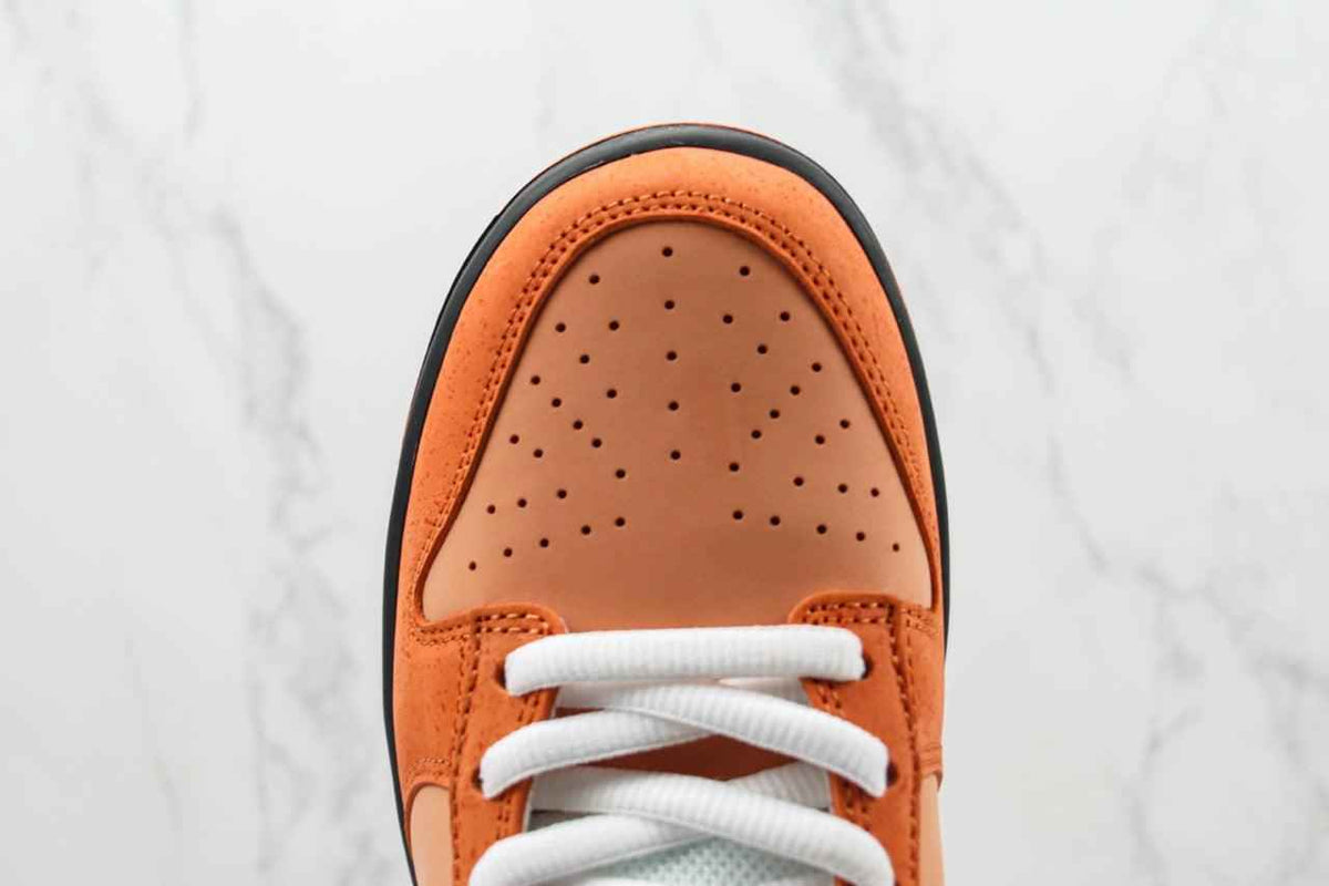 Custom Concepts x SB Dunk Low “Orange Lobster” SneakerNational
